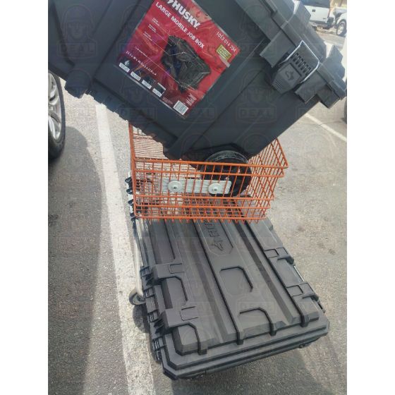 Husky Large Mobile Job Box stacked on a Husky Medium Rolling Toolbox on a Home Depot flat cart in the parking lot.