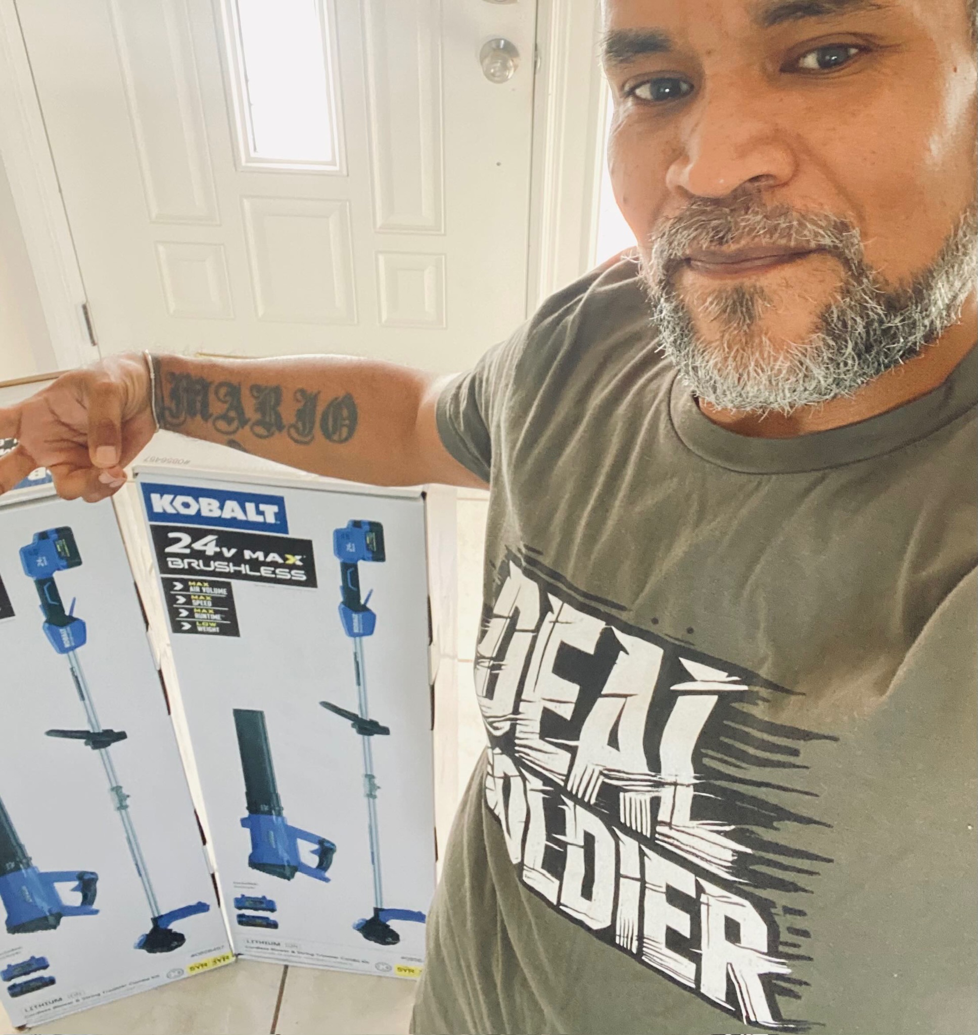 Deal Soldier member holding a Kobalt tool clearance find