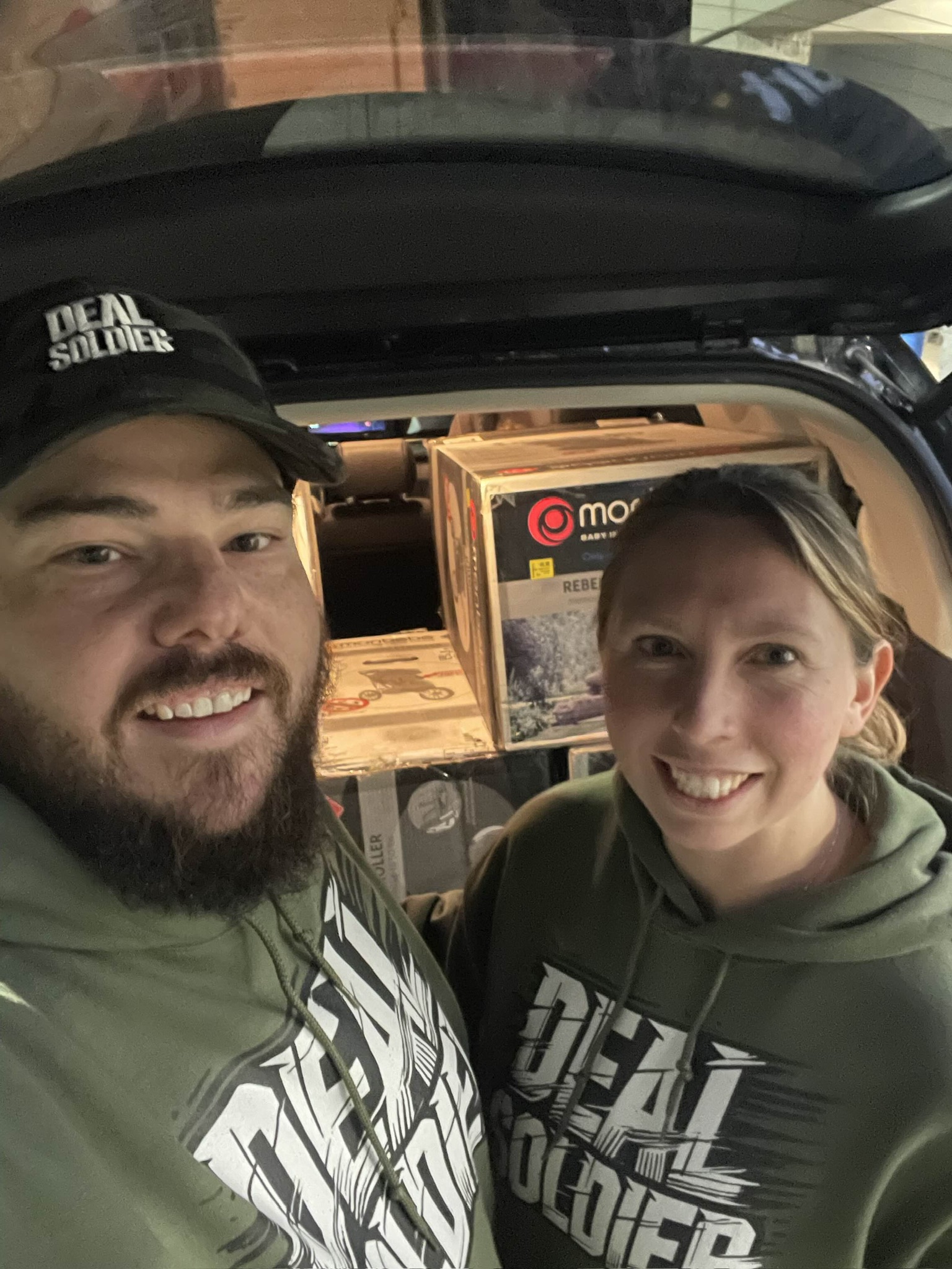Two Deal Soldier members with their clearance haul