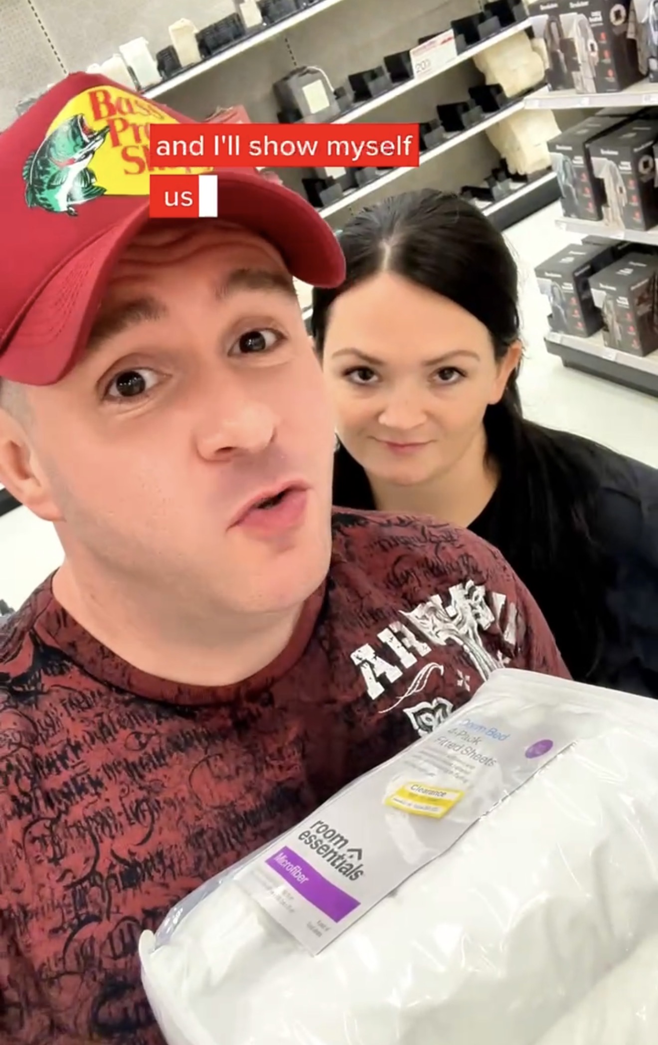 Sean and Kathleen, the founders of Deal Soldier, holding a clearance find at Target.