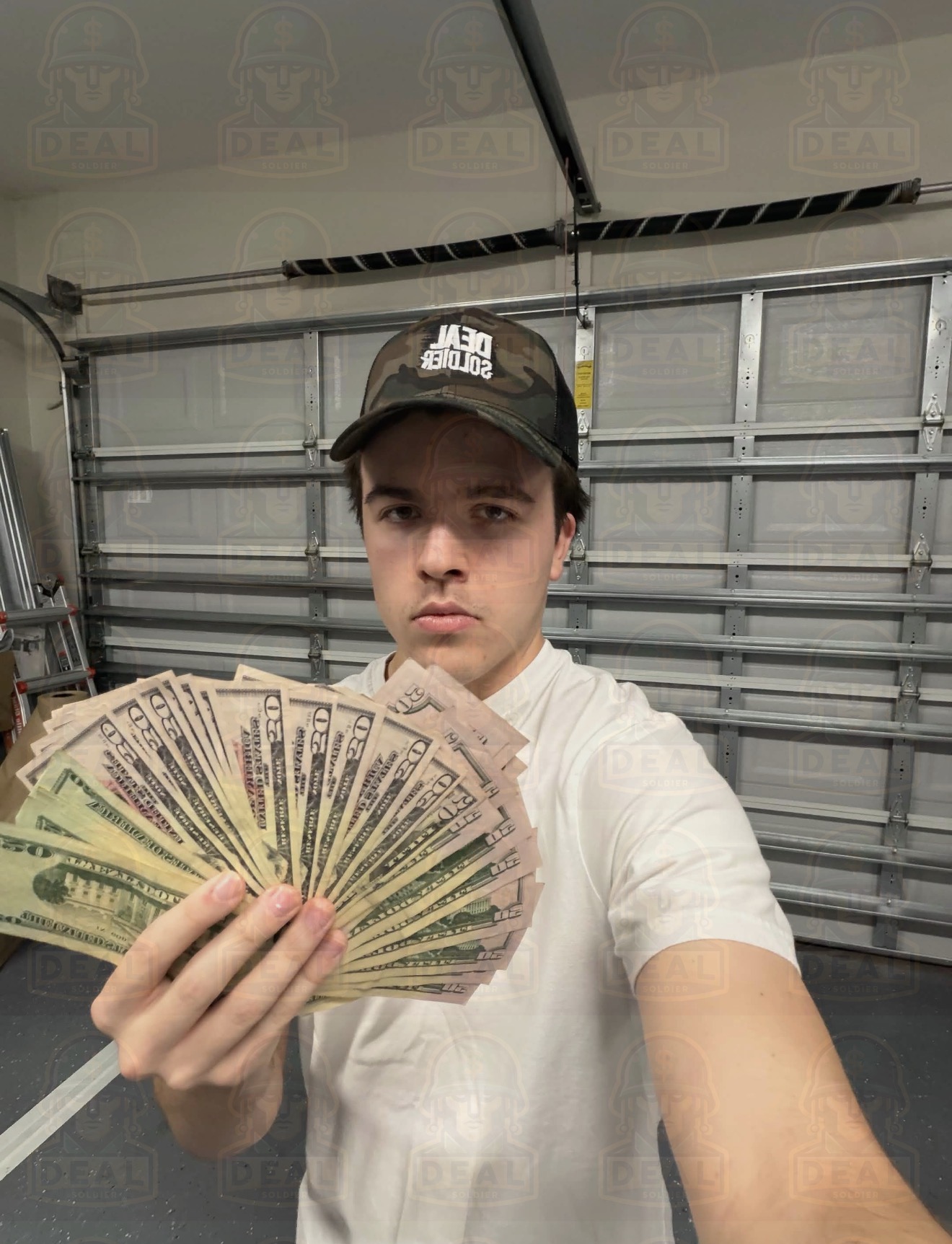 Member holding a fan of cash from reselling the deal