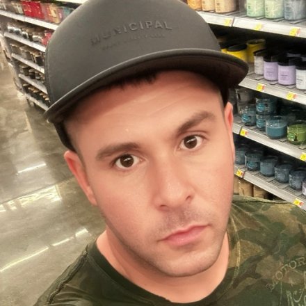 Sean, founder of Deal Soldier, in a Walmart aisle.