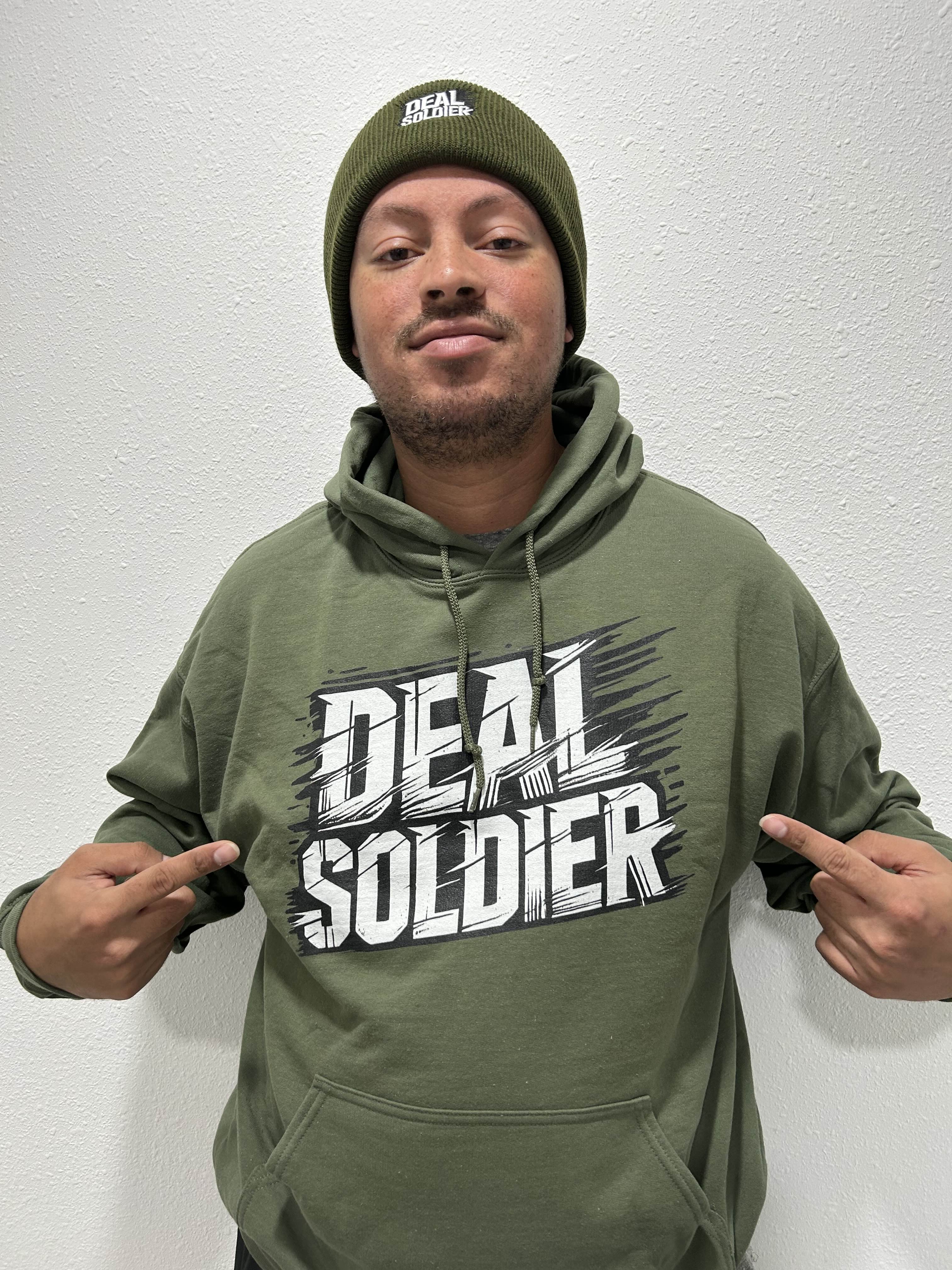 Deal Soldier member wearing a Deal Soldier hoodie and beanie.
